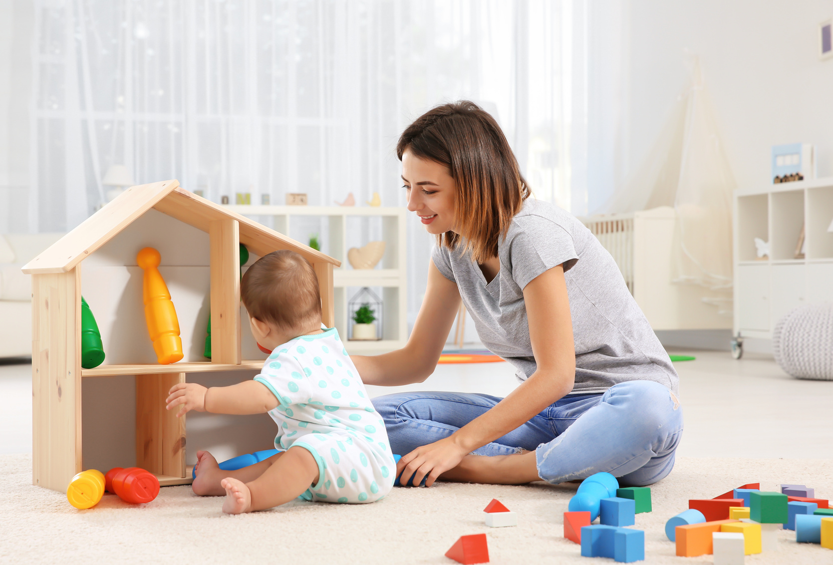 Mother with Baby Boy Playing at Home