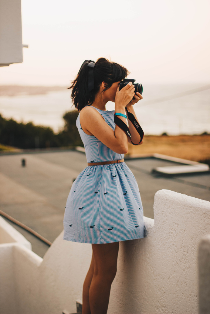 Woman Wearing Blue Sleeveless Dress